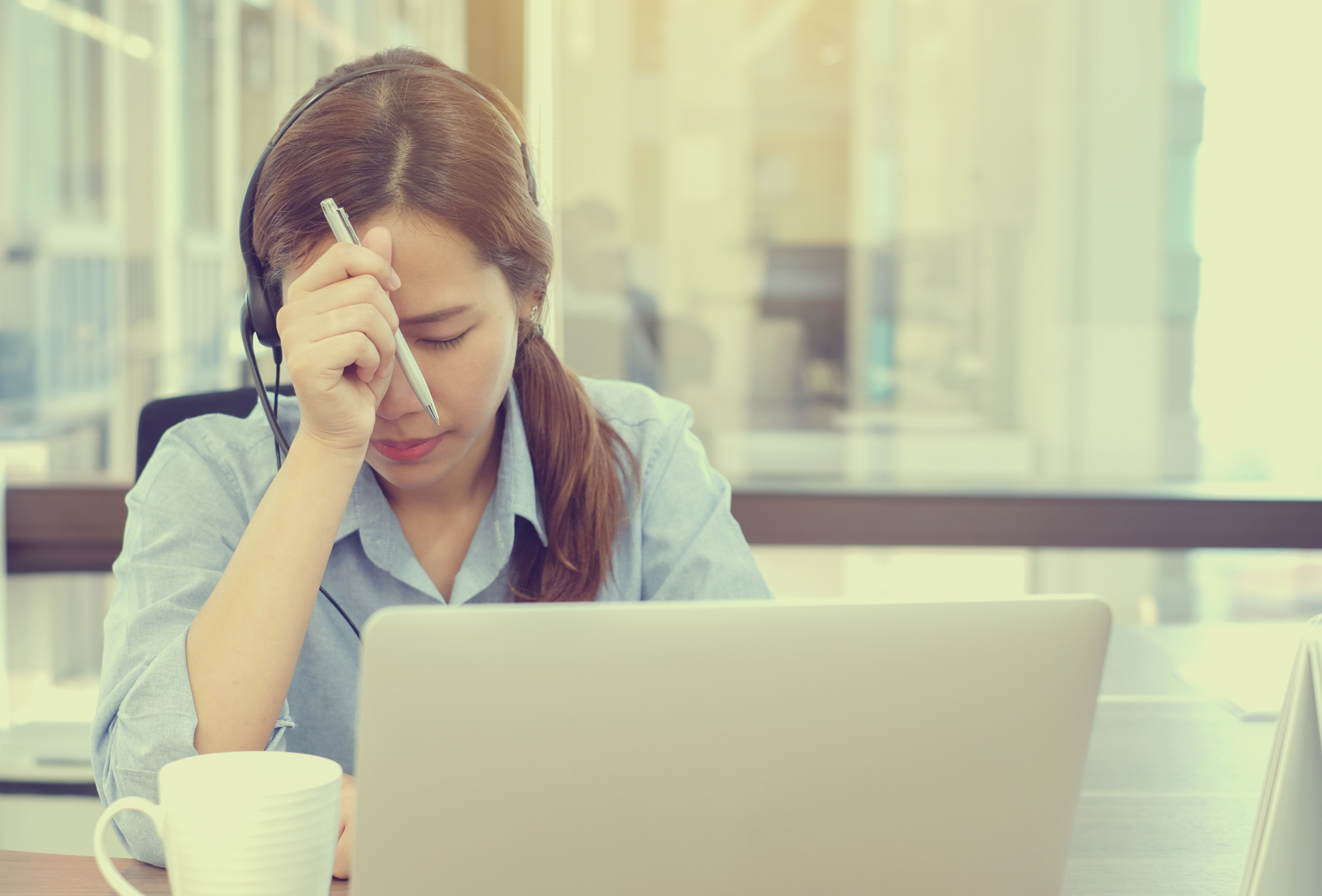 Close,Up,Call,Center,Asian,Woman,Stress,With,Work,Job